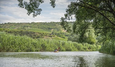 Canoeists, excursion on the Unstrut near Kirchscheidungen, Saxony-Anhalt, Germany, Europe