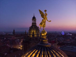 Dresden's old town from above.The glass dome of the Academy of Arts, crowned by a Fama figure,