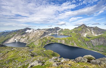 Mountain landscape with steep rocky peaks and lake Tennesvatnet, Krokvatnet and Fjerddalsvatnet, in