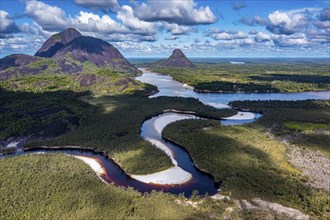 Black river and white sand beach before the granite hills, Cerros de Mavecure, Eastern Colombia