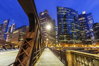 Skyline skyscrapers skyscrapers with Franklin-Orleans Street Bridge bridge at night in Chicago,