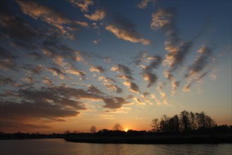 Sunset over the River Peene, Peene Valley River Landscape nature park Park, Mecklenburg-Western