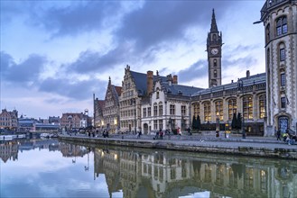 Medieval guild houses of Graslei Kai on the river Leie at dusk, Ghent, Belgium, Europe