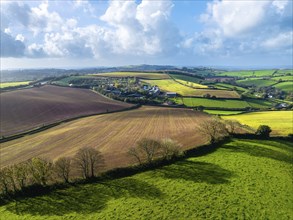 Lights and Shadows over Fields and Farms from a drone, Devon, England, United Kingdom, Europe