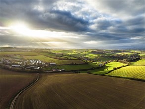 Lights and Shadows over Fields and Farms from a drone, Devon, England, United Kingdom, Europe