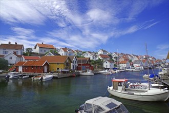 The small harbour of the archipelago island Gullhomen and small fishermen and leisure boats,