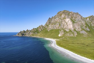 White sandy beach and mountains near Bleik, Andoya Island, Vesteralen, Norway, Europe