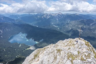 Aerial view, summit cross of the Waxenstein, Eibsee lake and Wetterstein mountains,