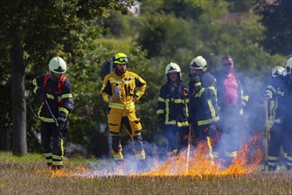 During controlled field fires, the firefighters were able to test various extinguishing methods,