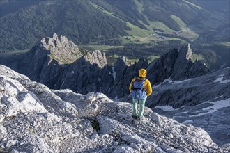 Hiker Looking down into the valley from the Hochkönig, Salzburger Land, Austria, Europe