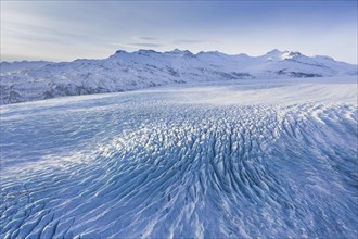 Aerial view over ice tongue Falljökull in winter, one of many outlet glaciers of Vatnajökull, Vatna