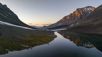 Kaskasavagge valley, mountain reflected in lake, Gaskkasjohka river, Kebnekaise massif, Lapland,