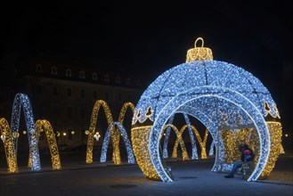 People in sphere, illuminated arch, walk-in illuminated sphere, cathedral square, world of lights,