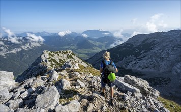 Mountaineer on a rocky path with mountain panorama, mountain tour to the summit of the Hochkalter,