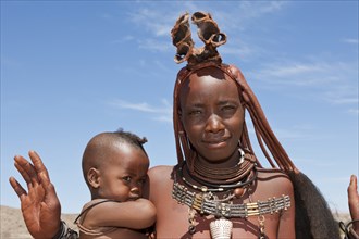 Himba woman with baby, Damaraland, Namibia, Africa