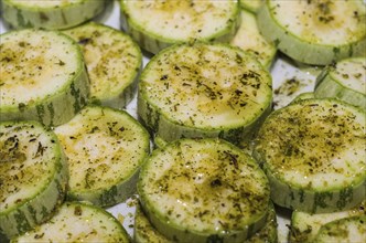 Delicious zucchini bbq, sliced â€‹â€‹zucchini on top of grill, close up photo