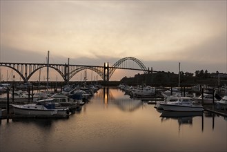 Yaquina bay bridge at sunset from the marina on the south side in Newport, Oregon