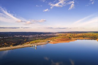 Drone aerial panoramic view of Sabugal Dam lake reservoir with perfect reflection, in Portugal