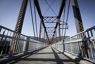 An old steel bridge repurposed into a walking path near Clark Fork, Idaho