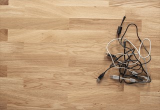 USB cables on a wooden table