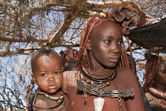 Himba woman with baby, Damaraland, Namibia, Africa