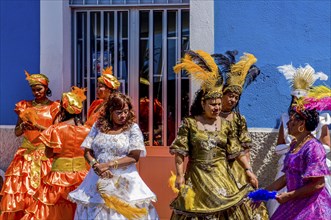 Colourful dressed women. Carnival. Mindelo. Cabo Verde. Africa