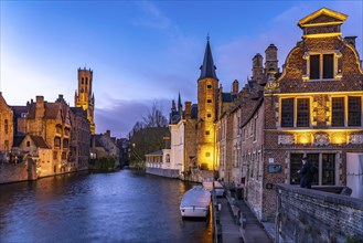 Rozenhoedkaai canal with belfry at dusk, Bruges, Belgium, Europe