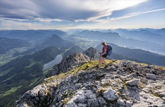 Hiker on a ridge in the mountains, Schaffauer, Wilder Kaiser, Tyrol, Austria, Europe