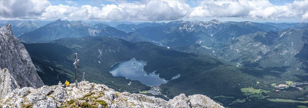 Aerial view, summit cross of the Waxenstein, Eibsee lake and Wetterstein mountains,