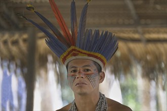 Tuyuca native man with a traditional feather hat, Manaus, Amazonia State, Brazil, South America