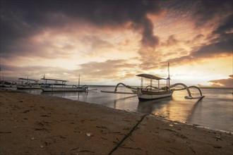 Jukung in the sea, typical landscape shot with a view of the horizon over the water, taken from a