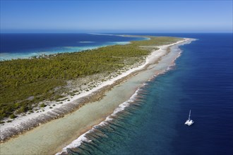 Catamaran off Apataki Atoll, Tuamotu Archipelago, French Polynesia, Oceania