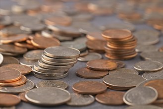 A concept close up photo of various US coins bunched together in a studio setting