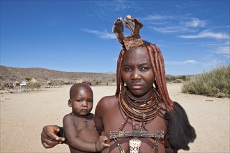 Himba woman with baby, Damaraland, Namibia, Africa