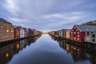 Old warehouses by the river Nidelva, Trondheim, Norway, Europe