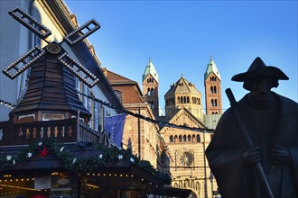 Speyer, Germany, January 2020: Silhouette of pilgrim statue called 'Jakobspilger', with Christmas