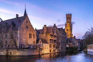 Rozenhoedkaai canal with belfry at dusk, Bruges, Belgium, Europe