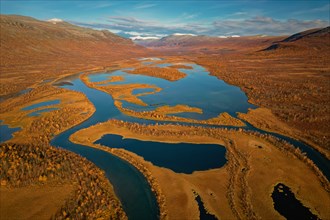 Drone shot, view of the valley Vistasvagge with the meandering river Vistasjakka and countless