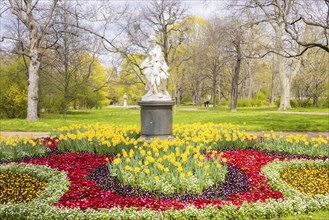 Spring at the Bürgerwiese in Dresden. Venus, Cupid the wings