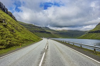 Road leading through a fjord, Streymoy, Faroe islands, Denmark, Europe