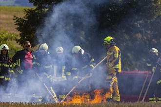 During controlled field fires, the firefighters were able to test various extinguishing methods,