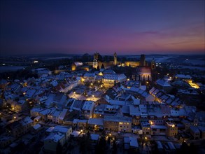 Castle and town of Stolpen on a winter evening