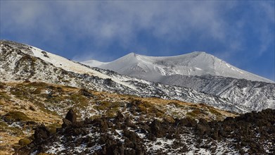 Lava scree, snow-capped peaks, blue sky, white clouds, Etna, volcano, Eastern Sicily, Sicily,