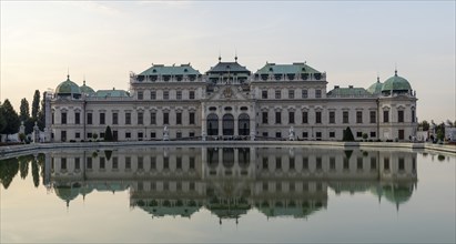 Belvedere Palace and fountain with reflection, Vienna, Austria, Europe