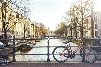 Bike over channel in Amsterdam city