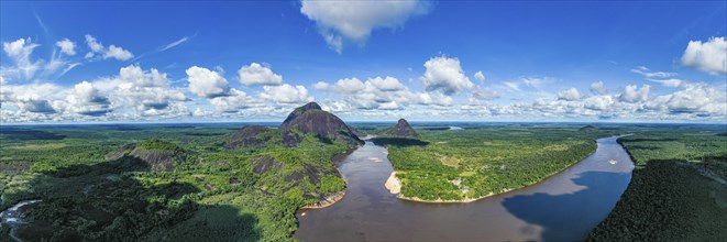 Black river and white sand beach before the granite hills, Cerros de Mavecure, Eastern Colombia