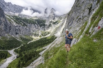 Mountaineer climbing the Waxenstein, Wetterstein Mountains, Garmisch-Patenkirchen, Bavaria,