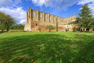 Church ruins of the Cistercian Abbey of San Galgano, Abbazia San Galgano, Gothic, in the back the