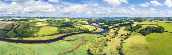 Panorama over Sharpham Meadows and Marsh over River Dart from a drone, Totnes, Devon, England,