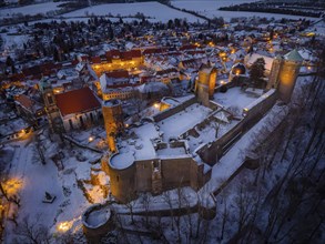 Castle and town of Stolpen on a winter evening